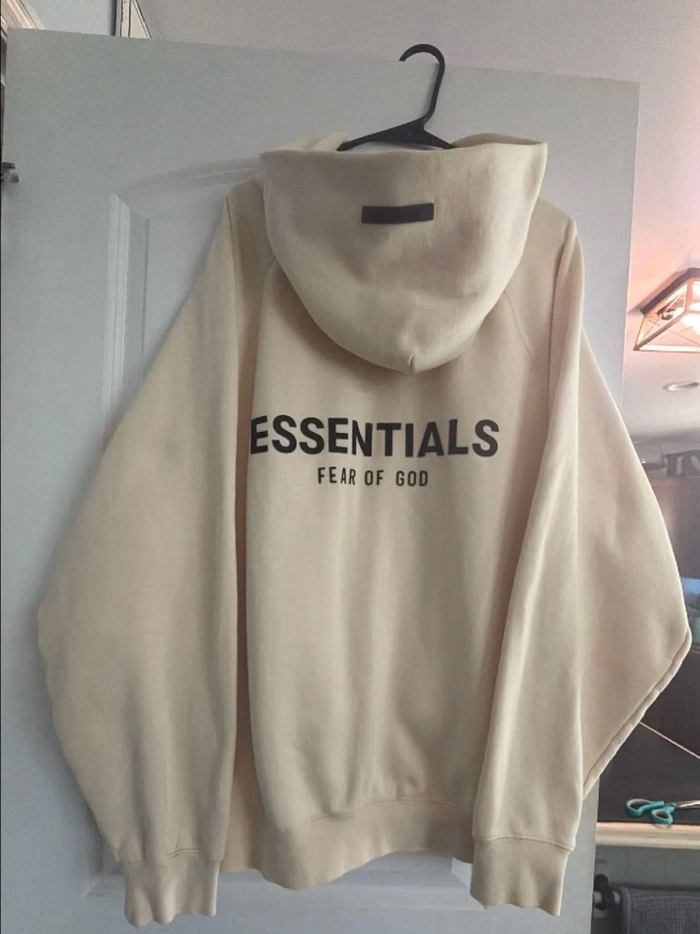 Fear of God Essentials Hoodie in Cream with Black Logo